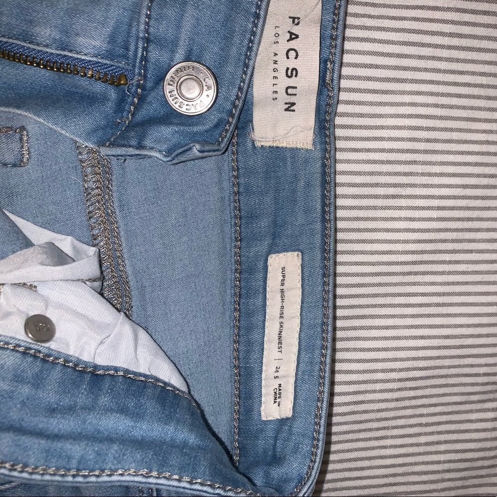 DISTRESSED BABY BLUE SKINNY JEANS